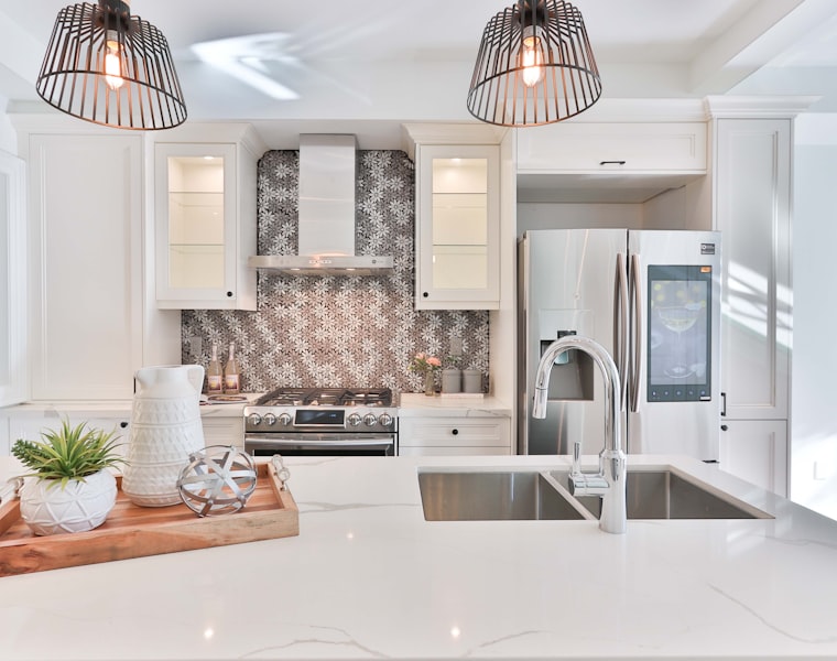 Bright white kitchen remodel with quartz countertops