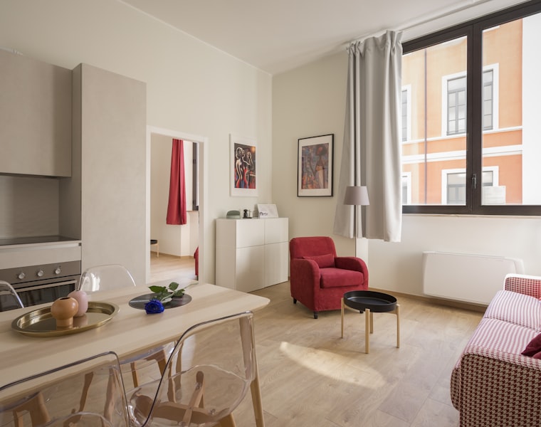 Renovated apartment living space with new finishes